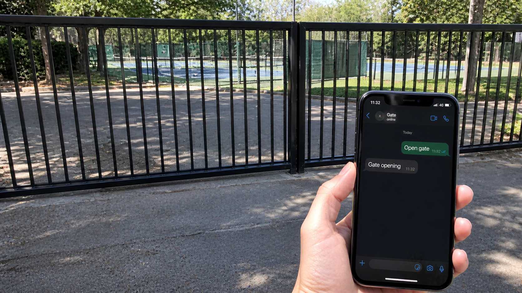 Black tennis club gate with hand holding phone